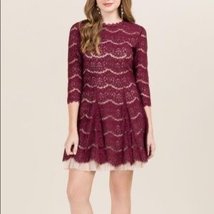 Francesca’s maroon lace overlay dress with sleeves